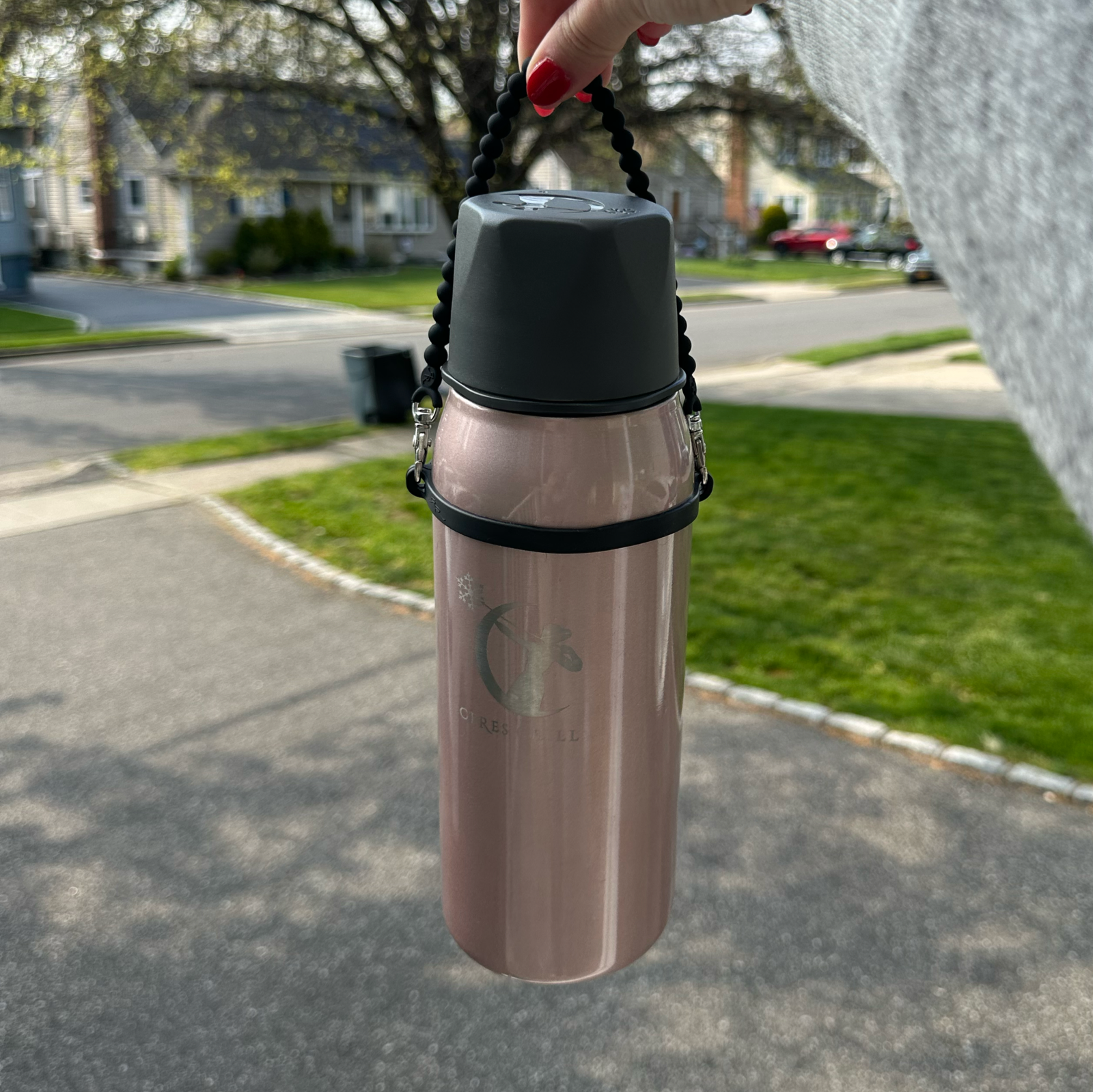 The water bottle accessory you need!! The Cutie Handle